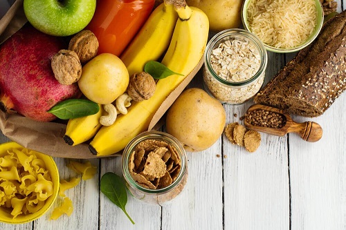 Cum să îți dezvolți masa musculară consumând carbohidrați