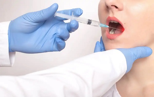 Medic ce tratează petele negre pe gingii