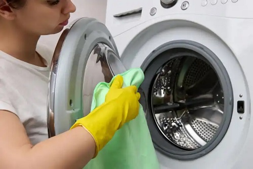 Cum să îndepărtați scamele din mașina de spălat