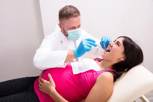 Gravidă la scanarea CT dentară