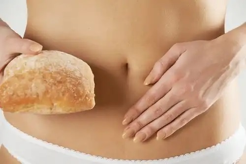 Femeie care nu consumă gluten