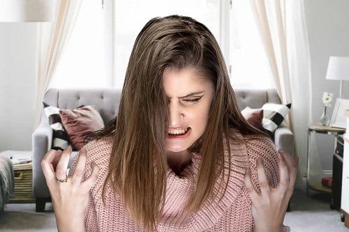 Femeie afectată de emoțiile aflictive